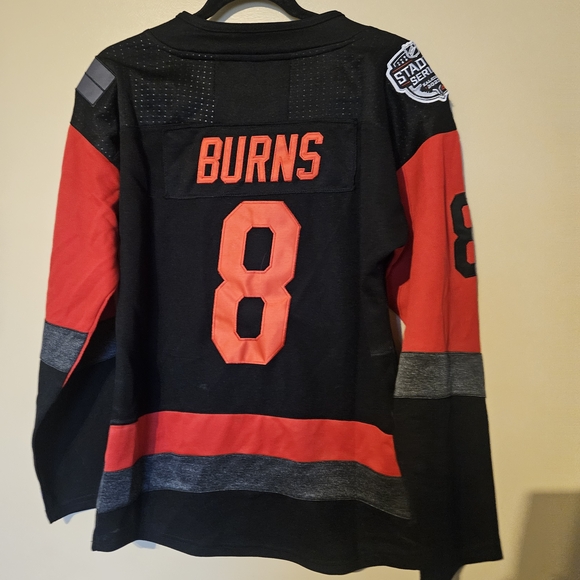 Carolina Hurricane Burns Black and Red Hockey Jersey - Picture 2 of 4